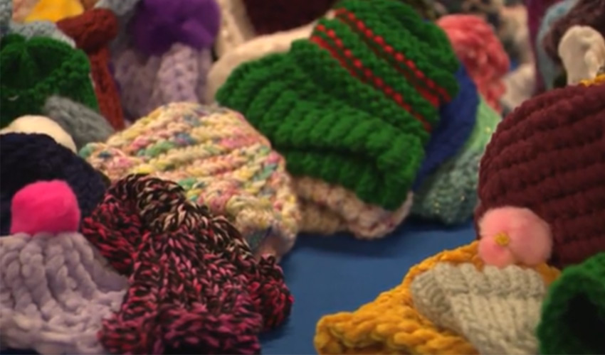 A bunch of knit hats.