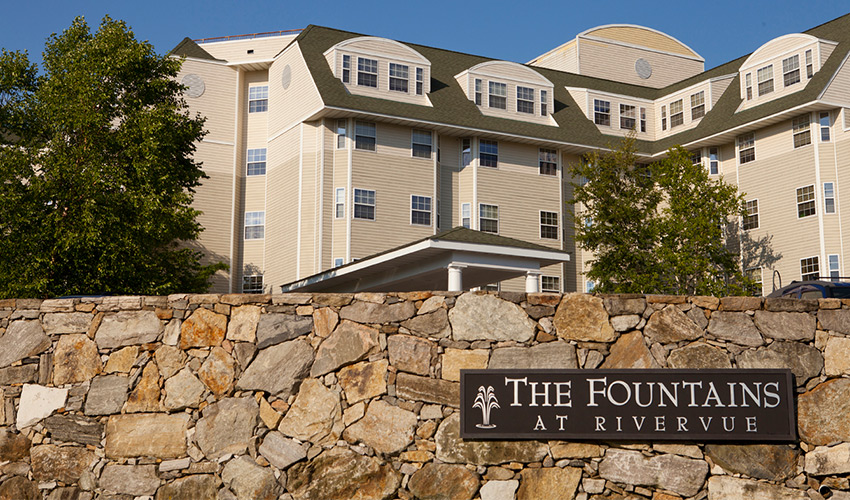 the outside of the fountains at rivervue with the sign