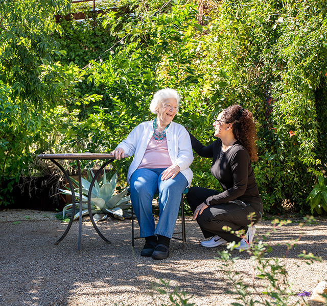 A resident with their caregiver.